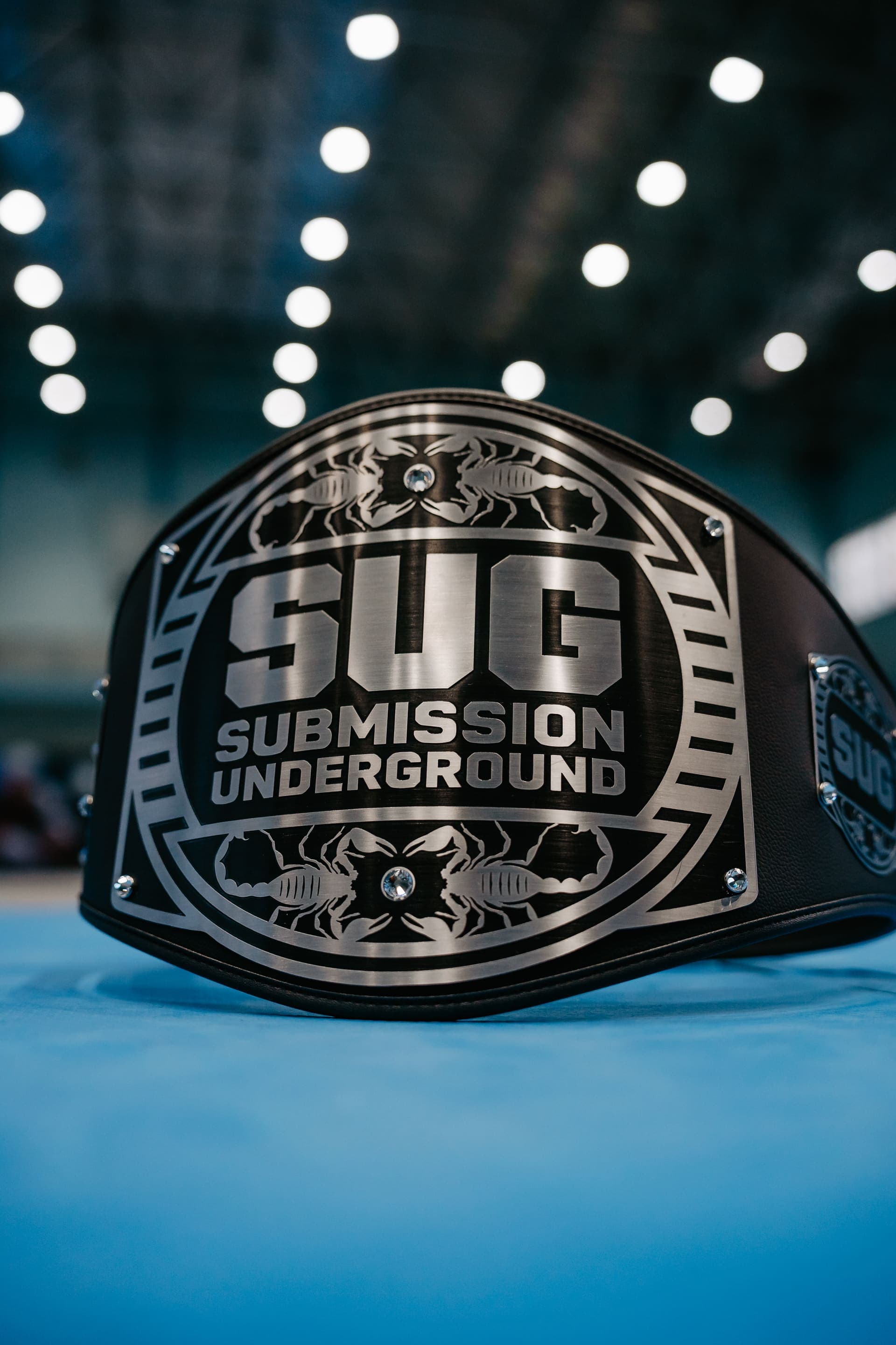 Grapplers competing inside the SUG World Tour cage